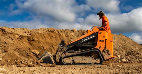 scag jackal mini skid steer|mini skid steer walk behind.